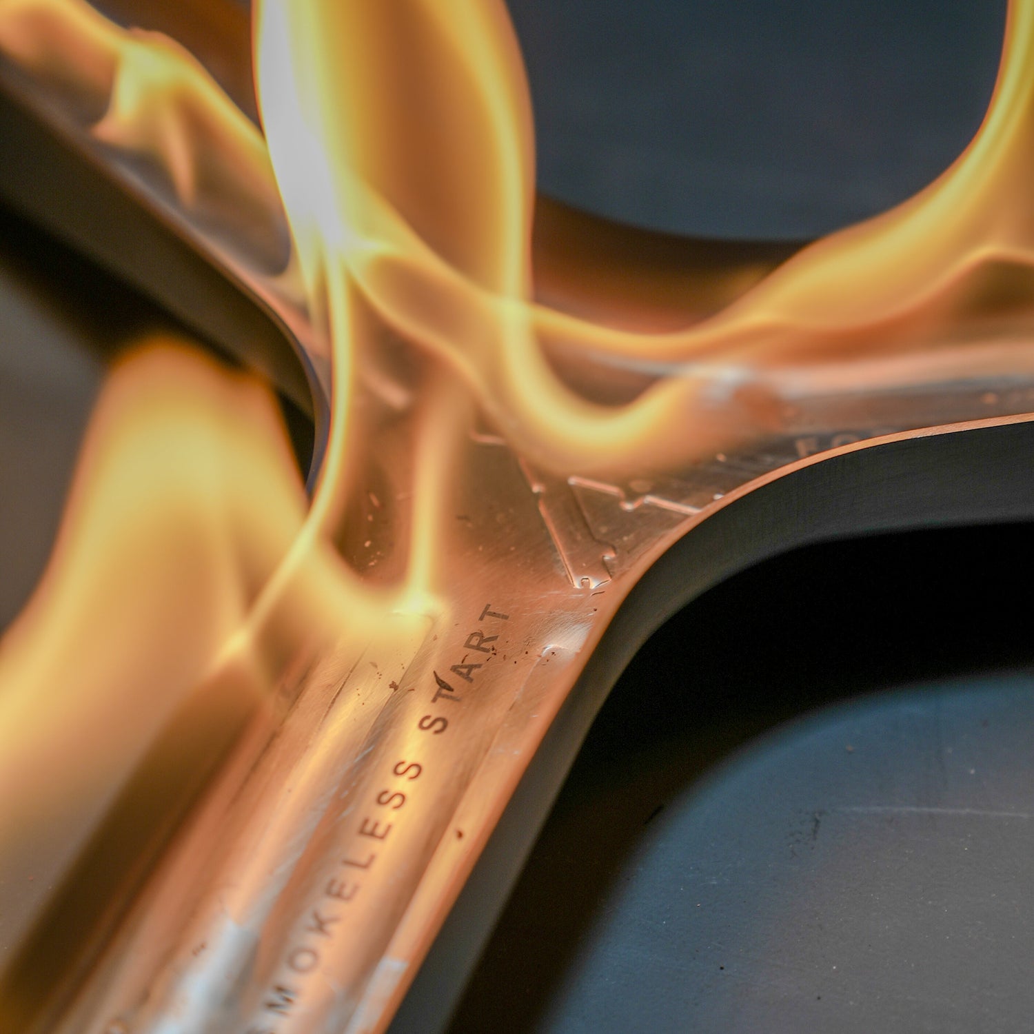 A close-up image of a fire starter device with a flame emerging from it, indicating the product is used to start fires.